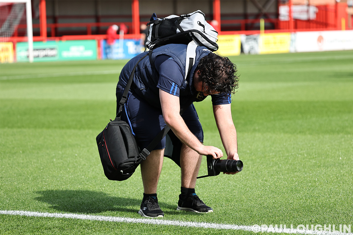 Aaron Bennis photographing football content
