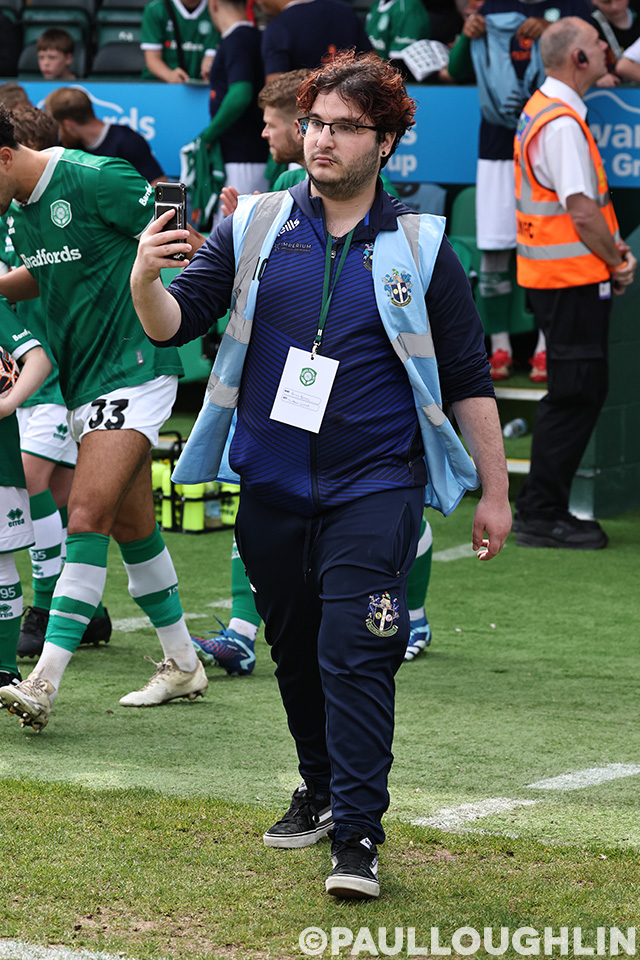 Behind the scenes football media work